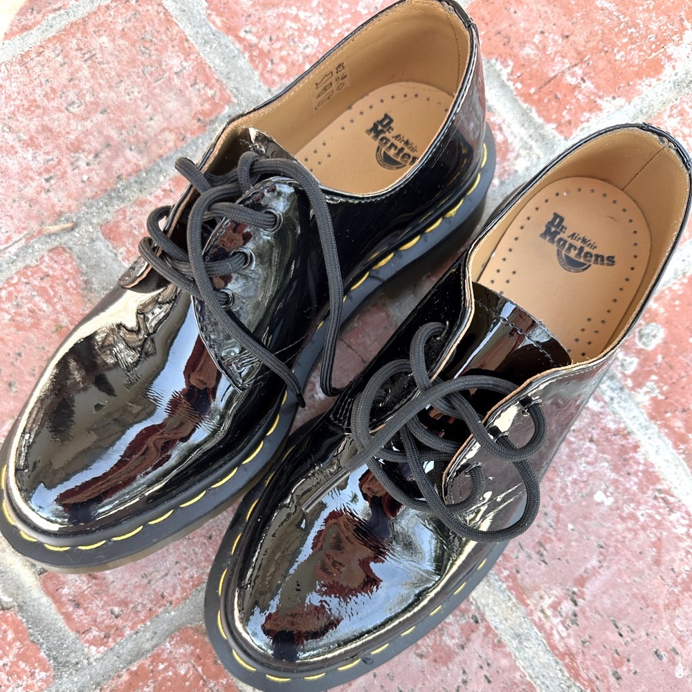 Dr. Martens Shiny Black Lace-Up Flats